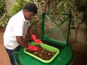 A man segregating kitchen waste
